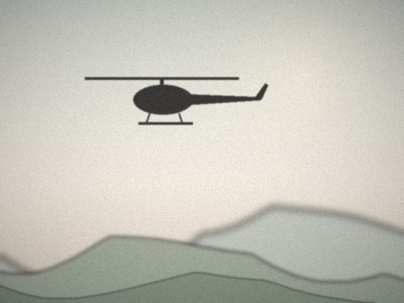 Silhouette d'hélicoptère au-dessus de montagnes enneigées